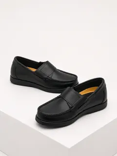 Zapatos mocasines colegiales de cuero negro con abrojo y diseño tipo náutico